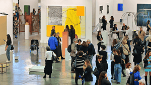 People meeting in an art gallery